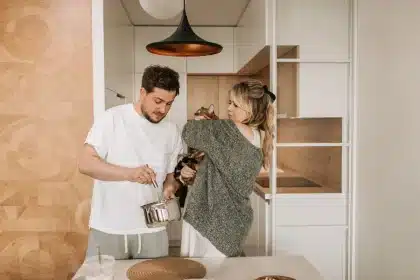 Couple in separate areas of their home, each pursuing their own interests and hobbies