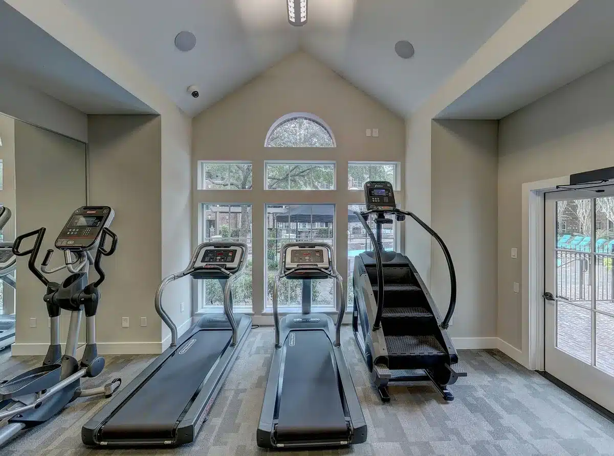 Contemporary gym facility with fitness equipment and training areas