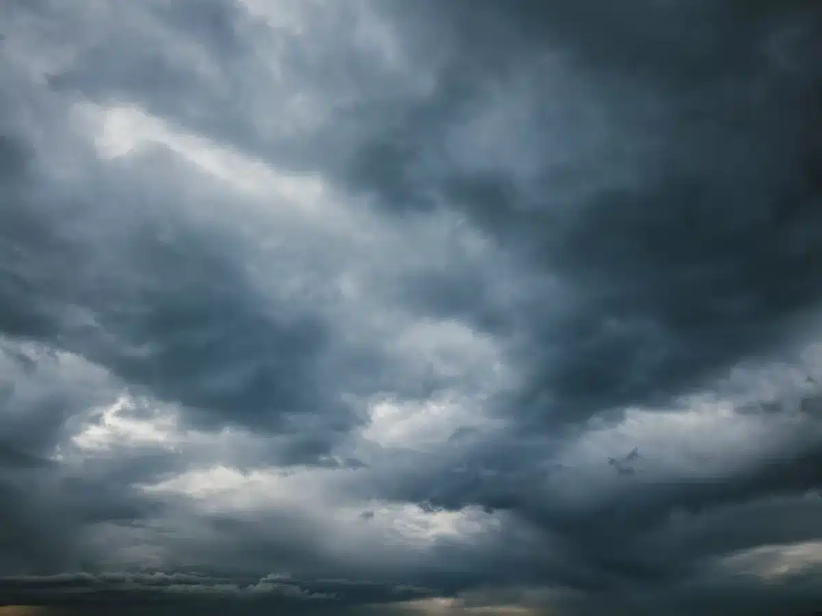 Met Éireann weather forecaster reviewing mixed conditions and rainfall predictions