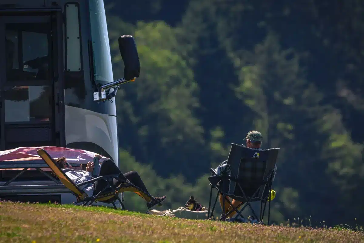 RV campers gathered together at a campsite, sharing a moment