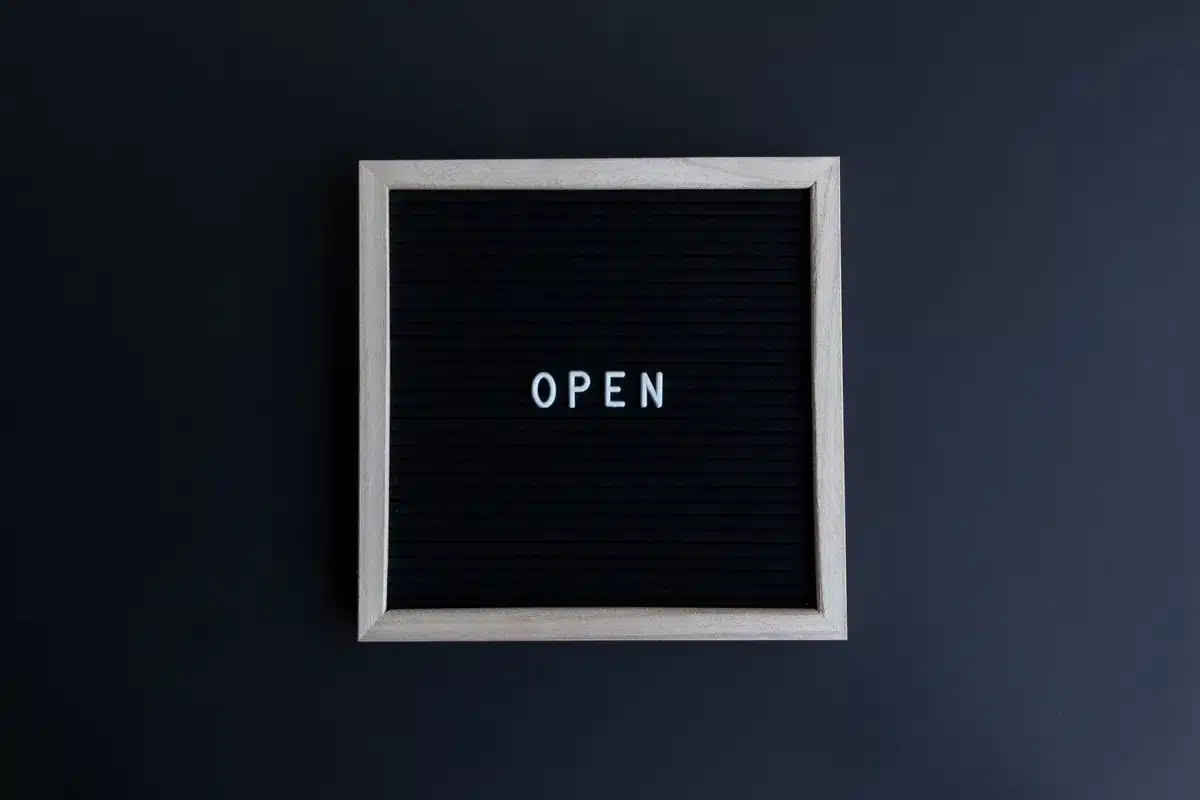 Enthusiastic announcement of restaurant reopening at new location