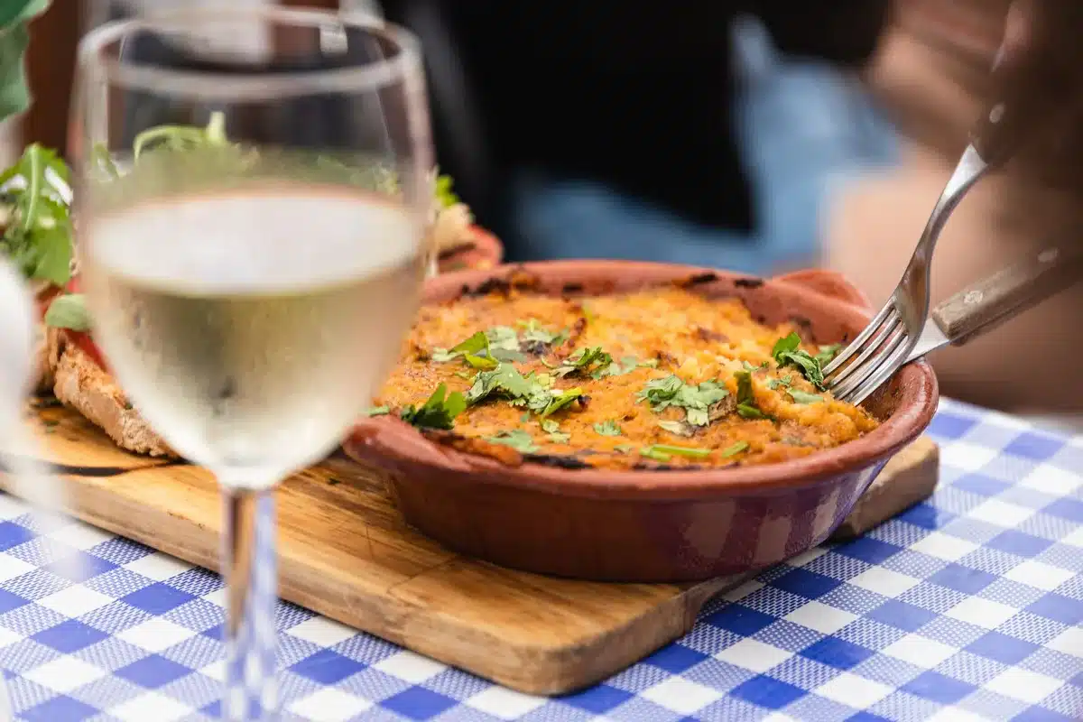 Crisp white wine poured alongside fresh seafood and Mediterranean dishes