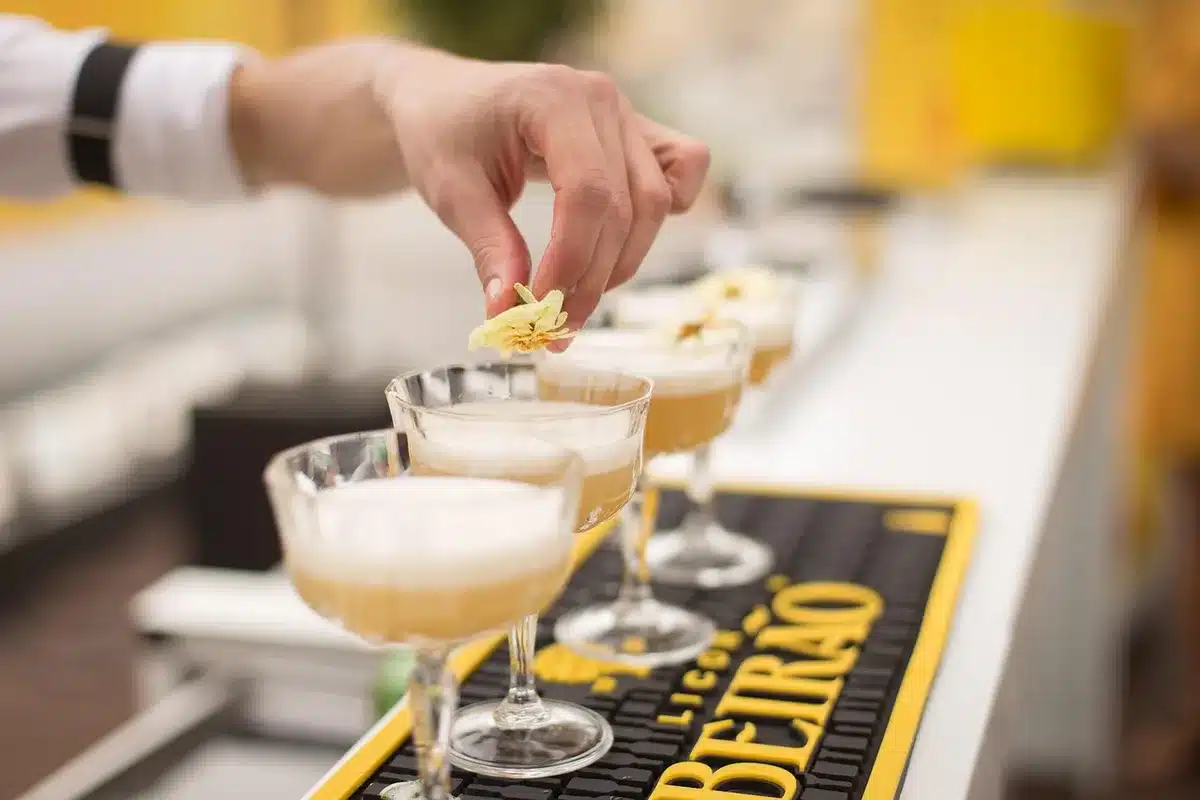 Bartender preparing craft cocktails in a Dublin bar setting