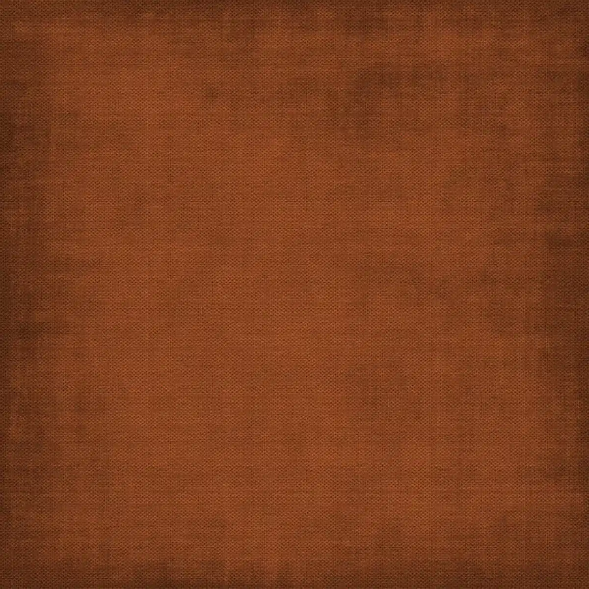 Close-up of earthy fabric swatches showing texture and muted colours